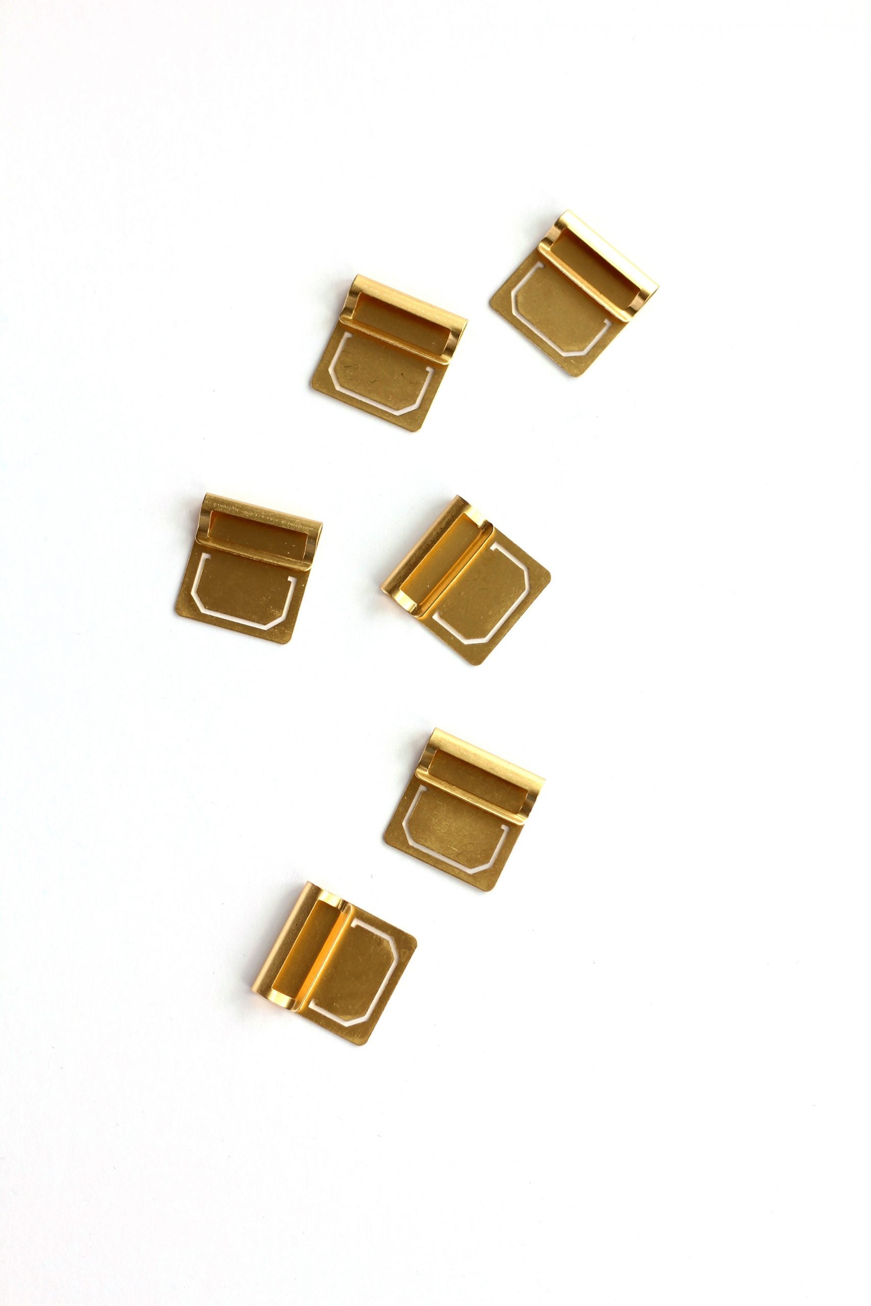 brass tabs