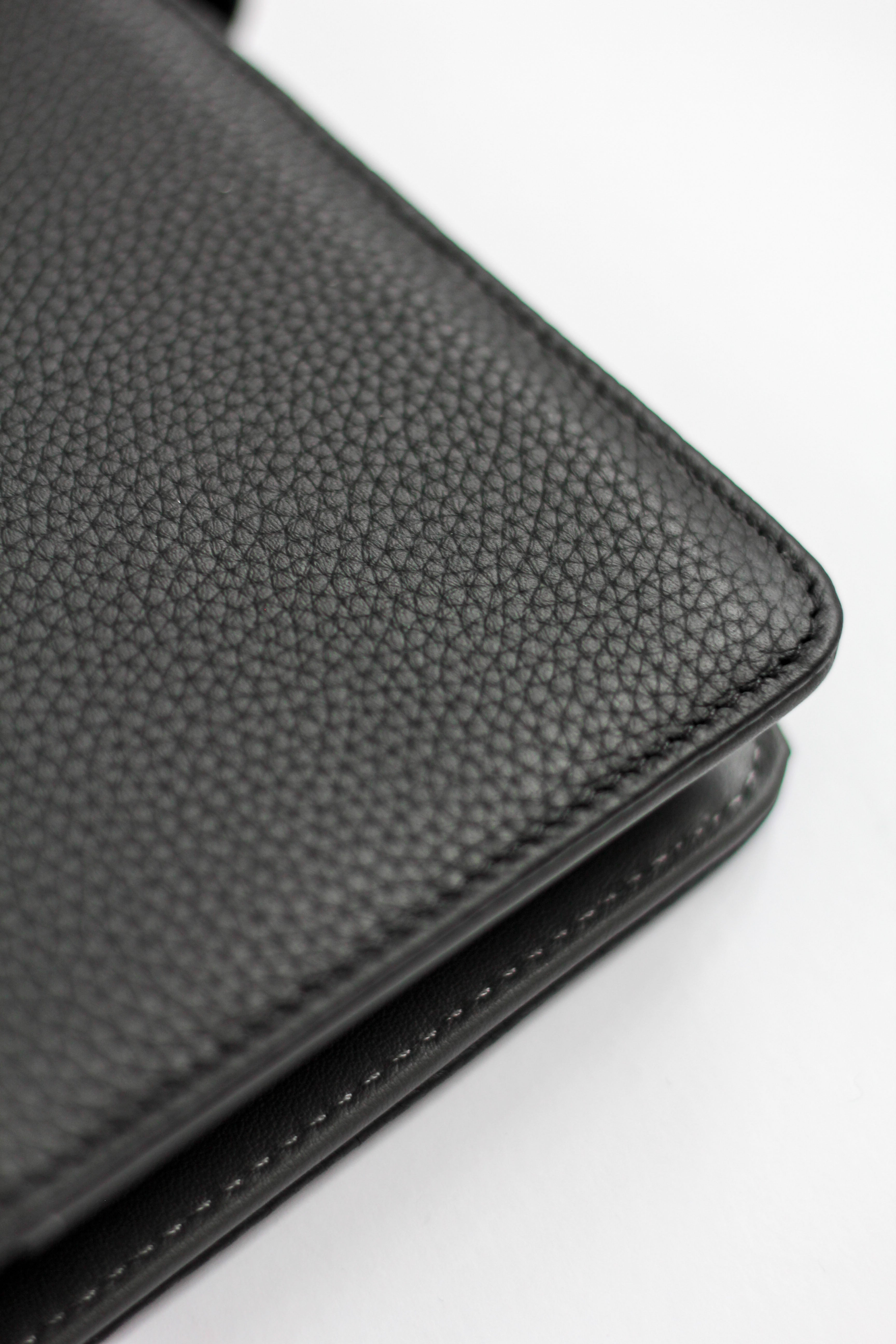black pebbled leather planner